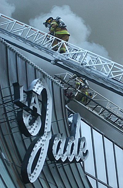 Fire fighter controling the fire at LA Jade