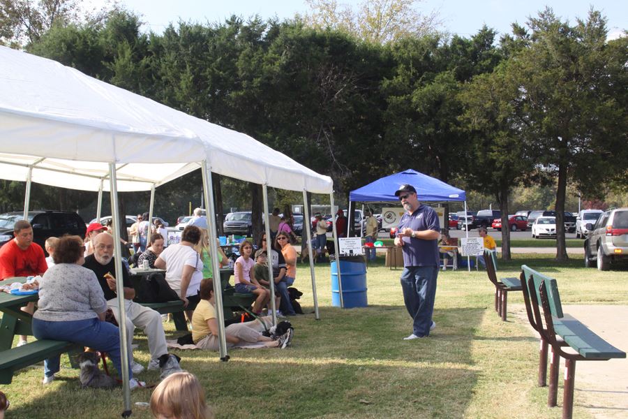 Man Speaking to Crowd