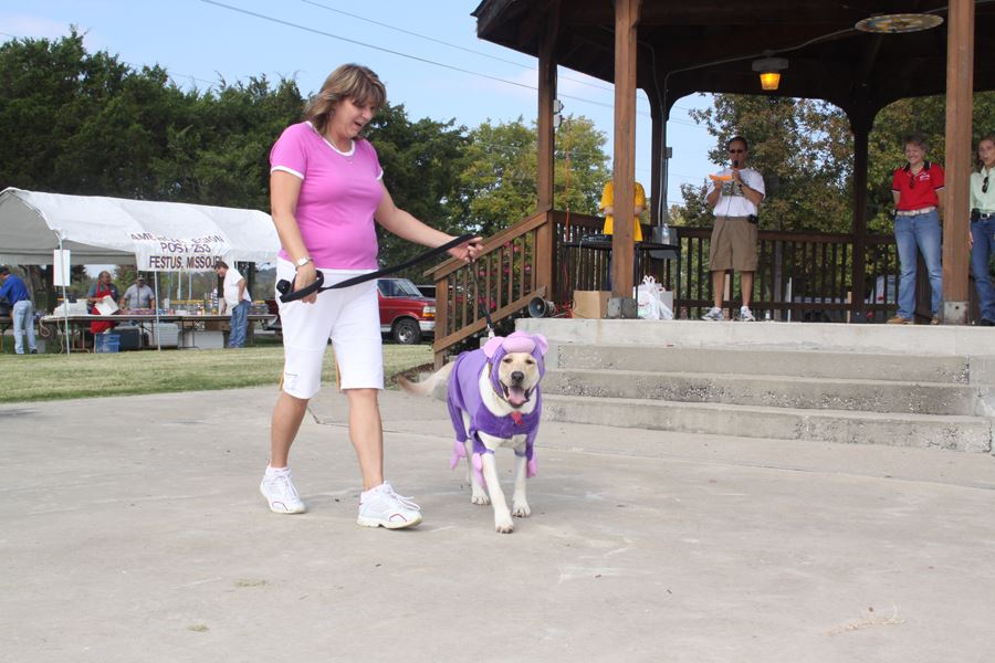 Woman Walking Dog in Costume